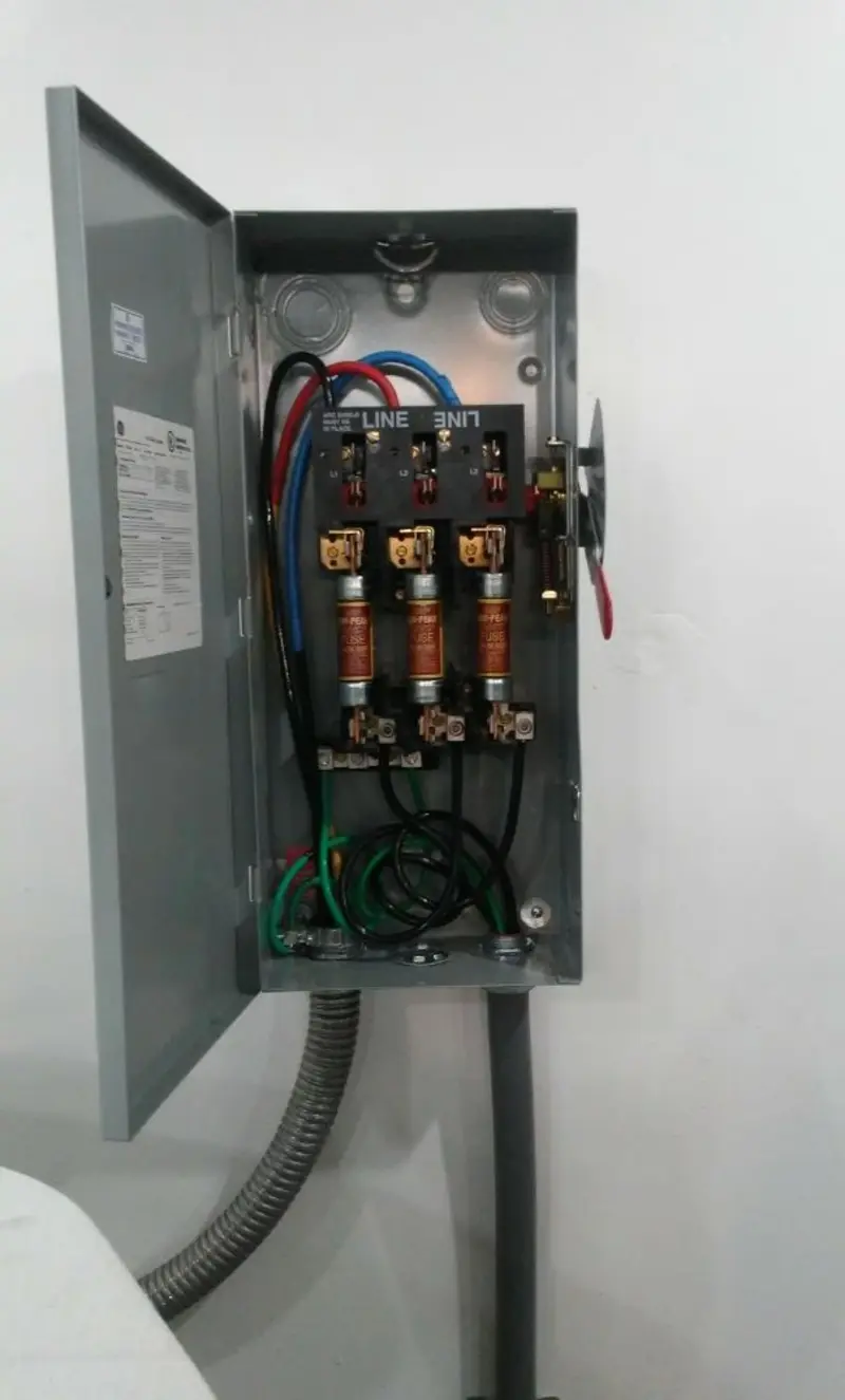 Three-phase disconnect switch installed for Smoke Detector Installation in Guyton