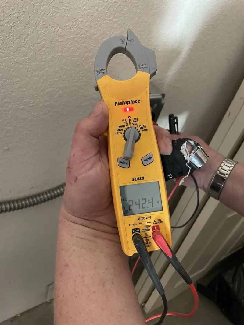 Voltage testing with clamp meter during Generator Installation in Guyton